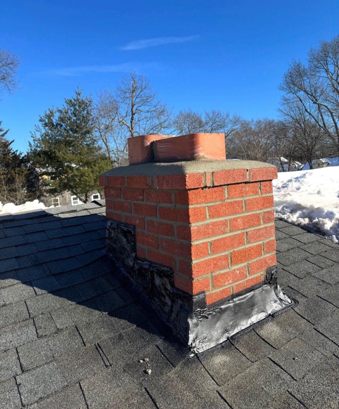Chimney work typical of the Boston area